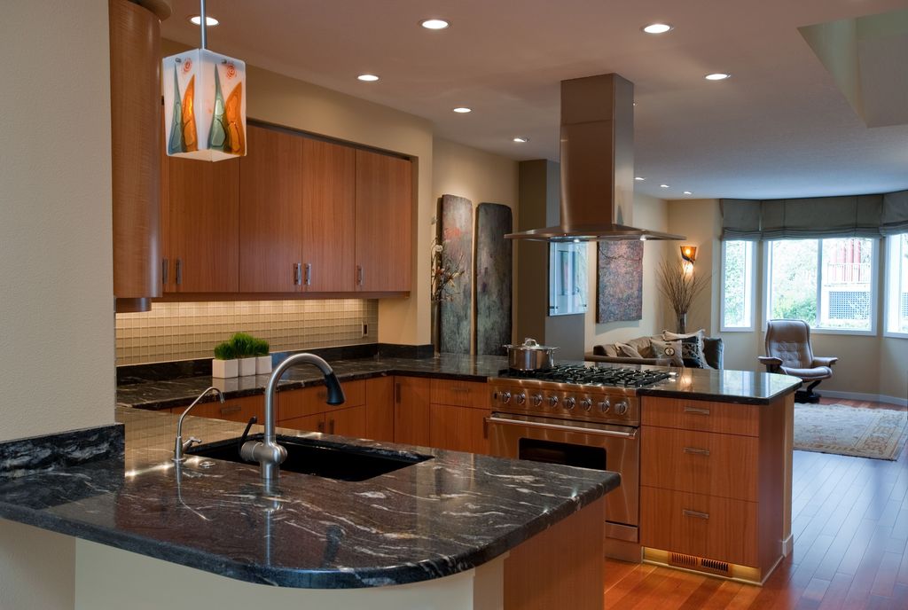 Contemporary Kitchen with Glass Tile, gas range, Island Hood, Standard height, Undermount sink, European Cabinets, can lights