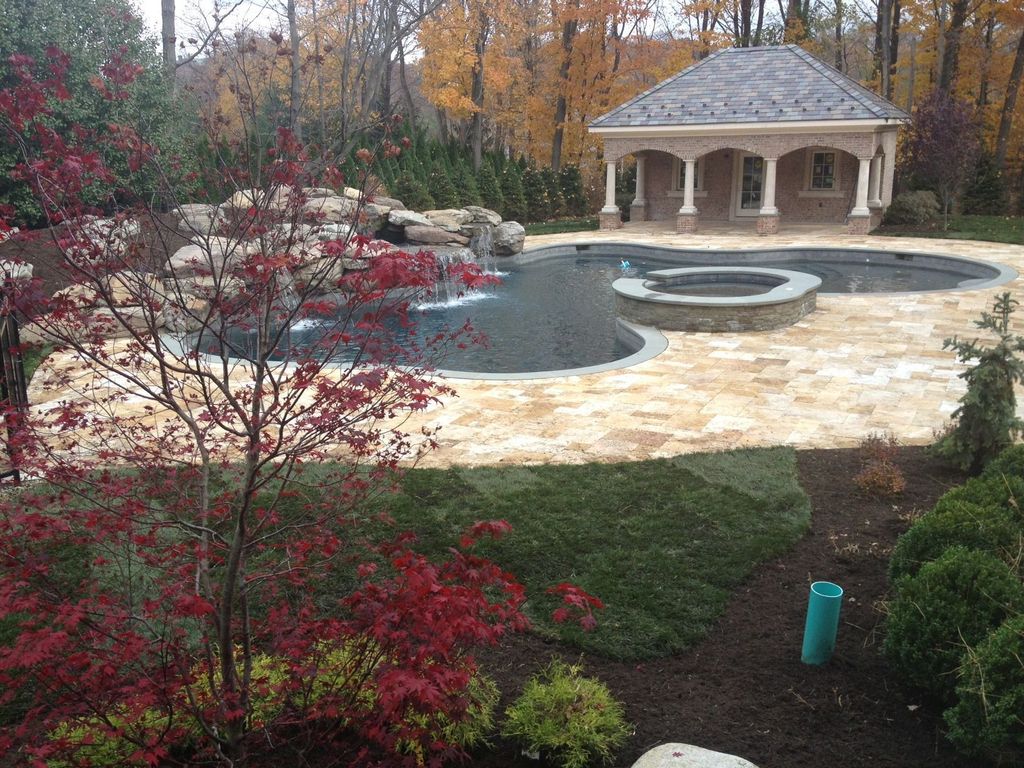 Traditional Swimming Pool with Pool with hot tub, exterior stone floors, French doors, Casement, Gazebo