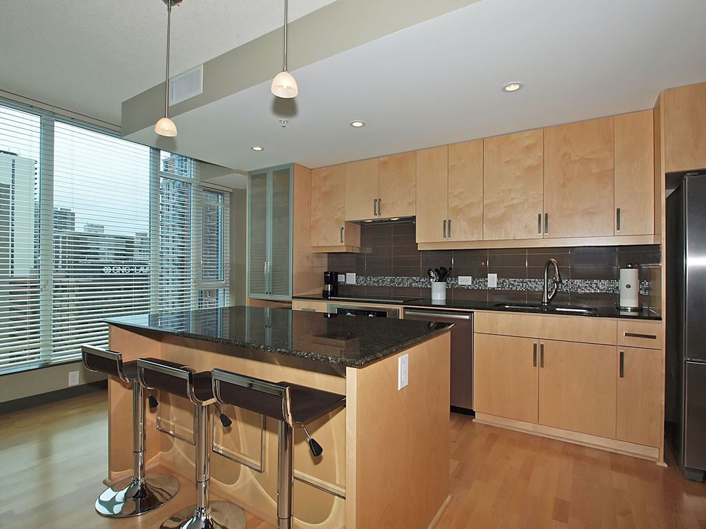 Contemporary Kitchen with Glass panel door, can lights, Standard height, European Cabinets, Glass panel, Undermount sink
