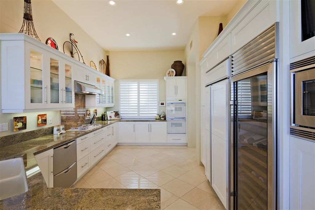 Modern Kitchen with Flush, Undermount sink, Casement, Glass panel, built-in microwave, electric cooktop, can lights, U-shaped