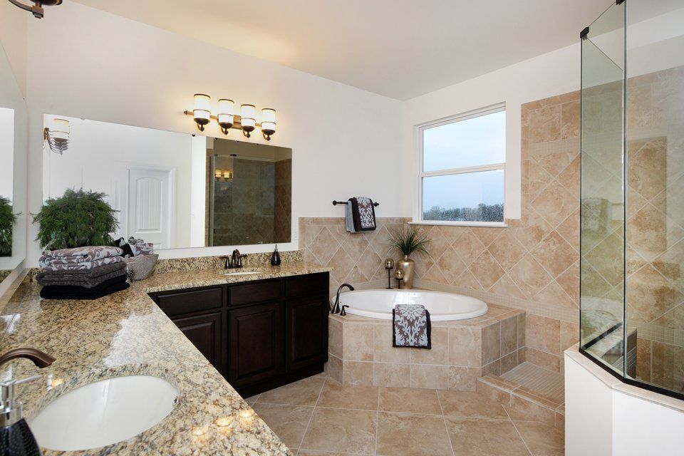 Mediterranean Full Bathroom with stone tile floors, Simple Granite, Undermount sink, wall-mounted above mirror bathroom light