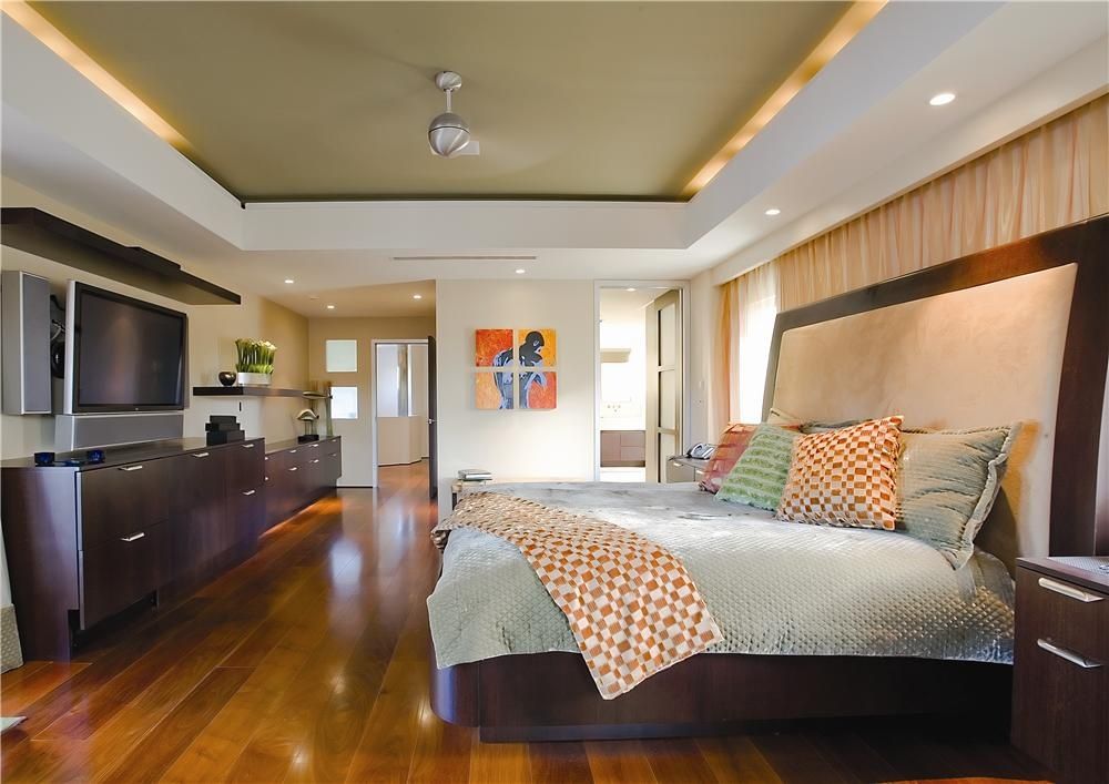 Contemporary Master Bedroom with Glass panel door, Box ceiling, can lights, Hardwood floors, Standard height