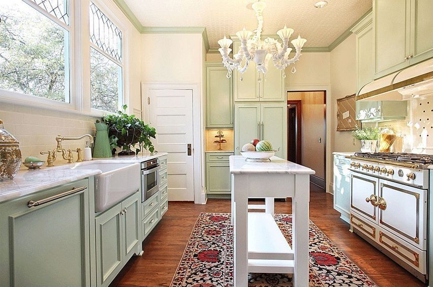 Traditional Kitchen with U-shaped, Subway Tile, Complex marble counters, Chandelier, Flat panel cabinets, Custom hood