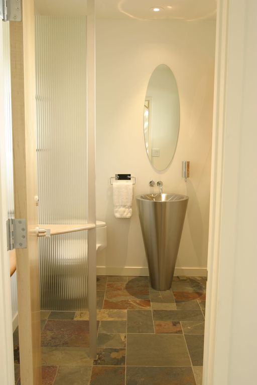 Contemporary Powder Room with Standard height, Powder room, Pedestal sink, Ren-wil mirror oval beveled mirror, can lights