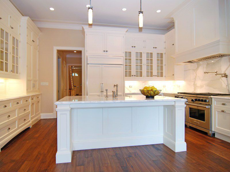 Traditional Kitchen with NewPort Pot Filler Traditional Wall Mount Cross Handles, Complex marble counters, Complex Marble