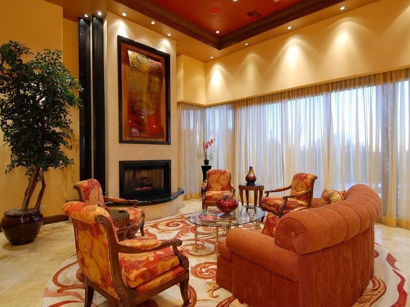 Traditional Living Room with insert fireplace, can lights, picture window, Casement, Standard height, Fireplace