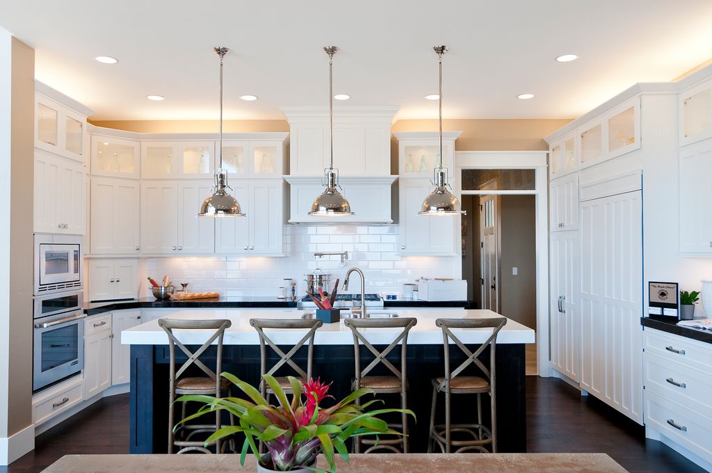 Cottage Kitchen with Corian designer white, Custom hood, Constance metal barstool, Undermount sink, Soapstone counters