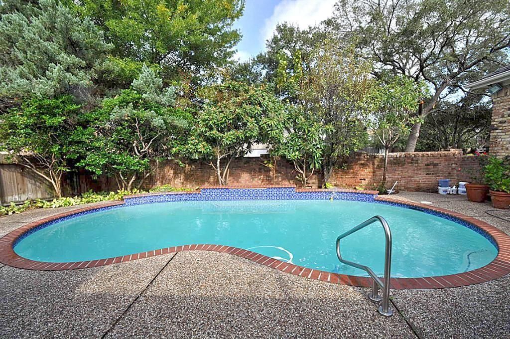 Traditional Swimming Pool with exterior tile floors, Other Pool Type, Fence, exterior concrete tile floors