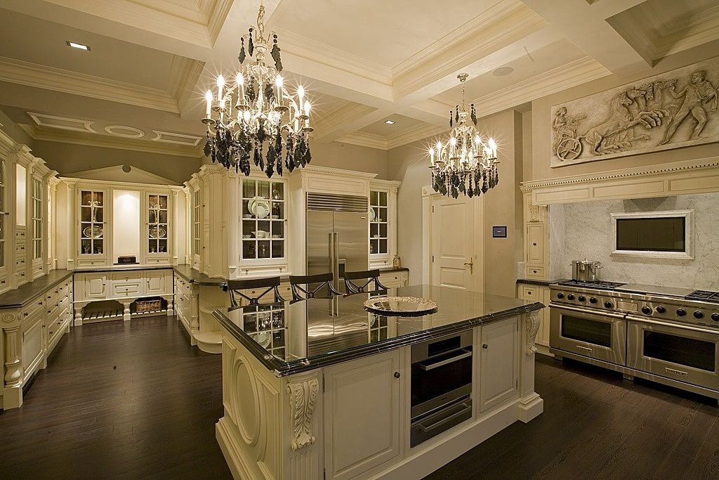 Traditional Kitchen with Custom cabinetry, Simple Granite, Breakfast bar, Framed Partial Panel, Standard height, Wall Hood