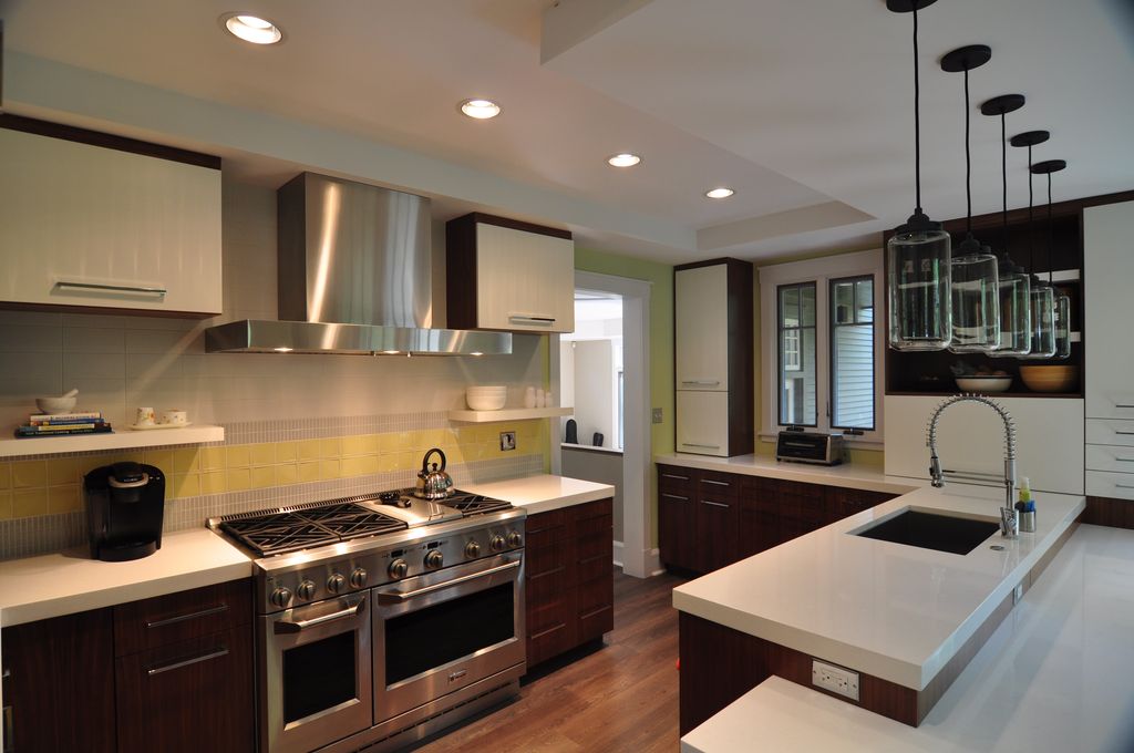 Contemporary Kitchen with Built-in bookshelf, Undermount sink, European Cabinets, Fireclay tile oyster shell 3 x 6, Casement