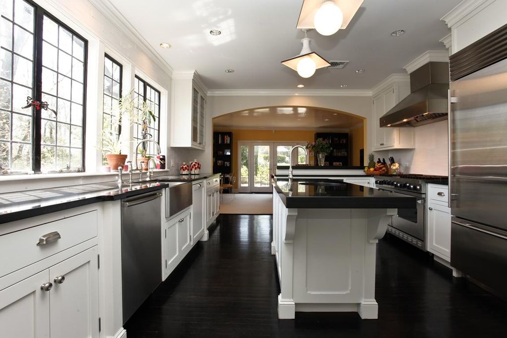 Traditional Kitchen with Wall Hood, Framed Partial Panel, Glass panel, double oven range, Flat panel cabinets, Kitchen island