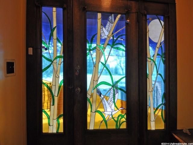 Contemporary Front Door with Stained glass window, Glass panel door, exterior tile floors, exterior concrete tile floors