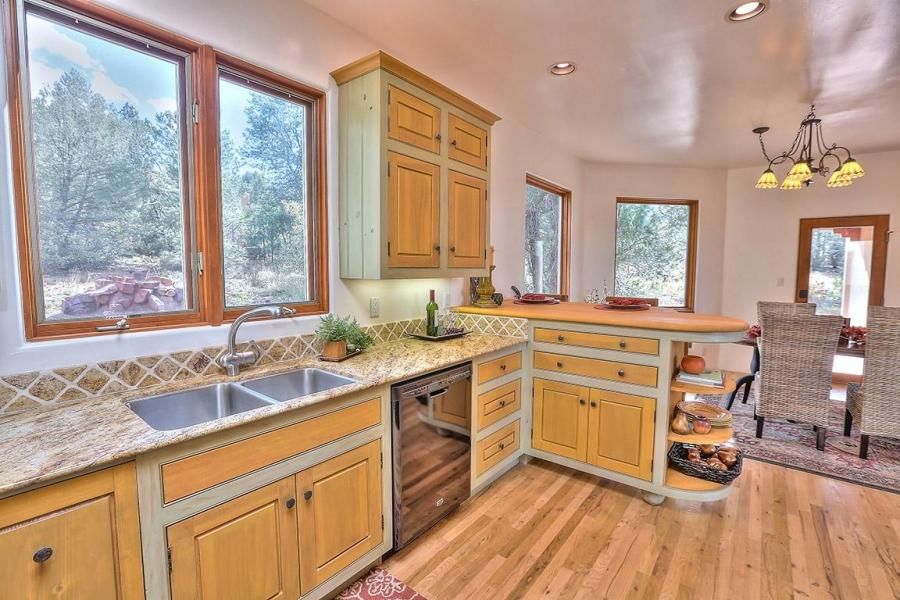 Eclectic Kitchen with European Cabinets, Complex Granite Tile, Inset cabinets, dishwasher, Multiple Sinks, can lights