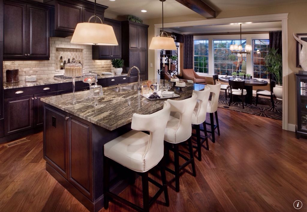 Traditional Kitchen with Breakfast bar, Standard height, stone tile counters, Pendant light, Kitchen island, Exposed beam