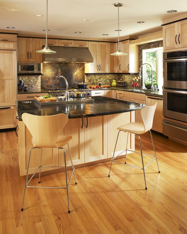 Contemporary Kitchen with Kitchen island, Soapstone counters, Built In Panel Ready Refrigerator, Ceramic Tile, dishwasher