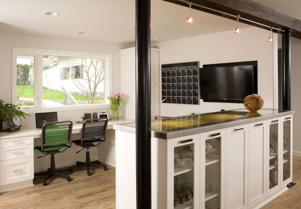 Contemporary Home Office with Hardwood floors, Staples, Columns