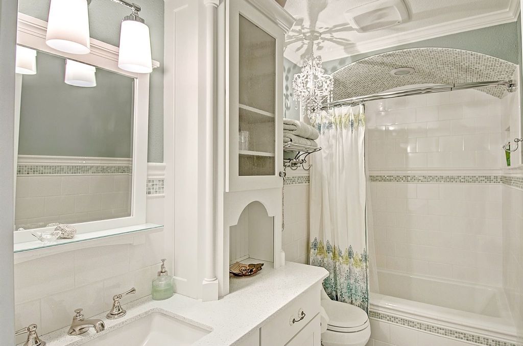 Traditional Full Bathroom with Shower, pentalquartz bq850, Paint, Chandelier, Flush, Bathtub, shower bath combo, Glass panel