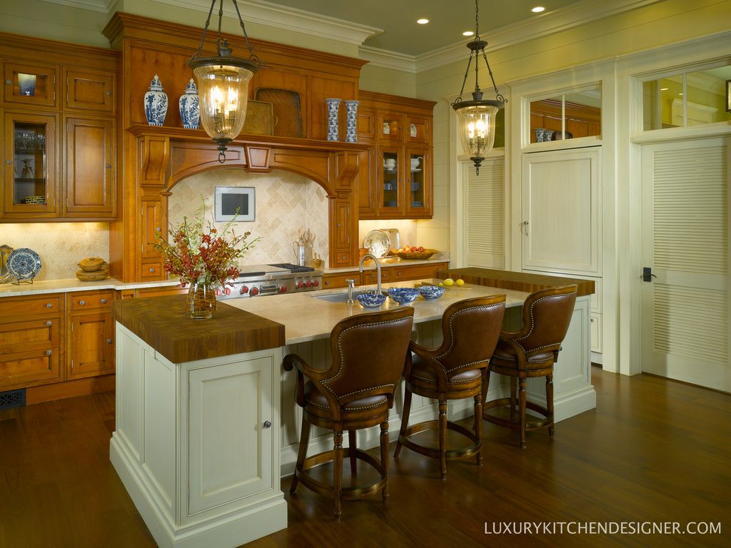 Traditional Kitchen with Standard height, Wood counter slab, Flat panel cabinets, Kitchen island, Undermount sink, can lights