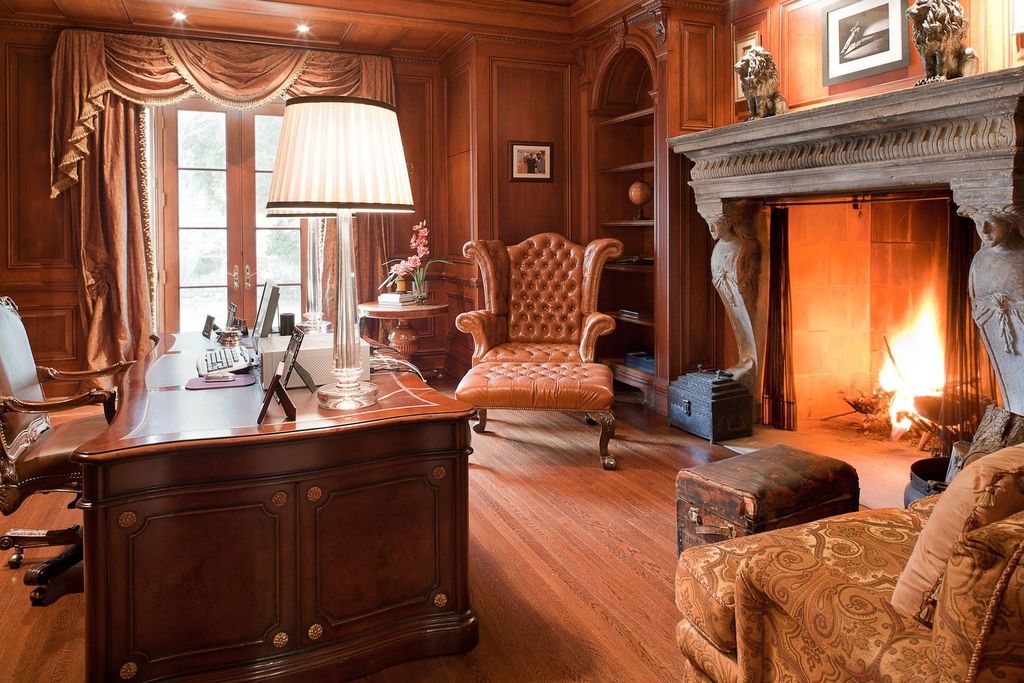 Traditional Home Office with Fireplace, Crown molding, Hardwood floors, Chair rail, Built-in bookshelf, Cement fireplace