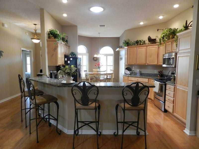 Traditional Kitchen with Built In Refrigerator, Traditional Style Memory Swivel Counter Stool, Pendant light, flush light