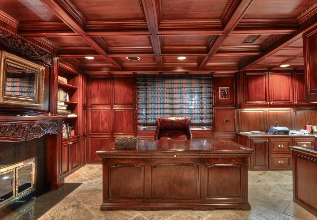 Traditional Home Office with Built-in bookshelf, insert fireplace, can lights, Box ceiling, Standard height, Fireplace