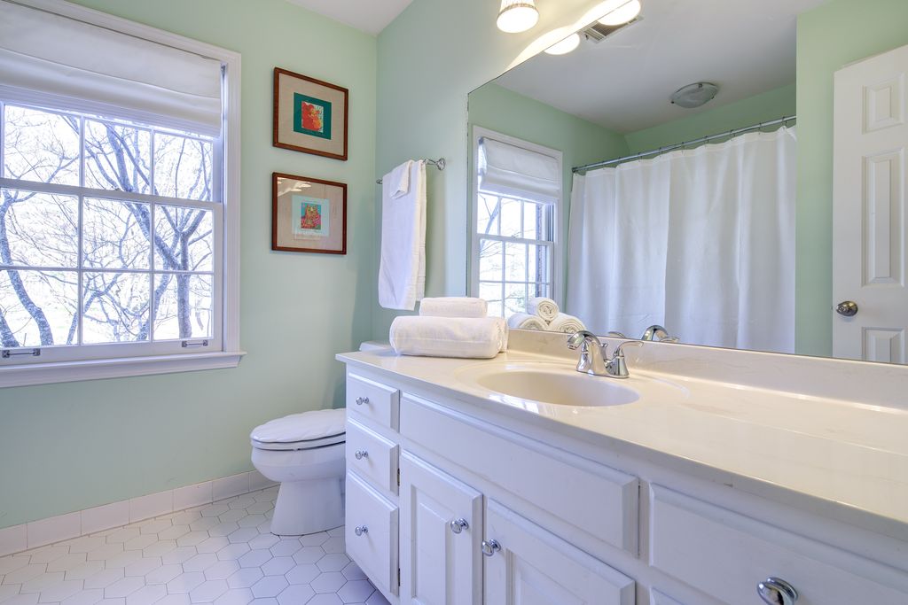 Traditional Full Bathroom with stone slab showerbath, penny tile floors, Corian counters, Paint 1, Undermount sink, Full Bath
