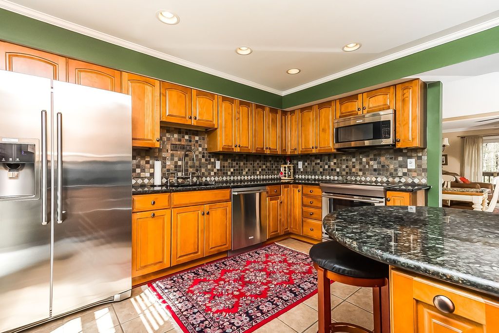 Country Kitchen with built-in microwave, Ms international jania cream limestone tile, L-shaped, Complex granite counters