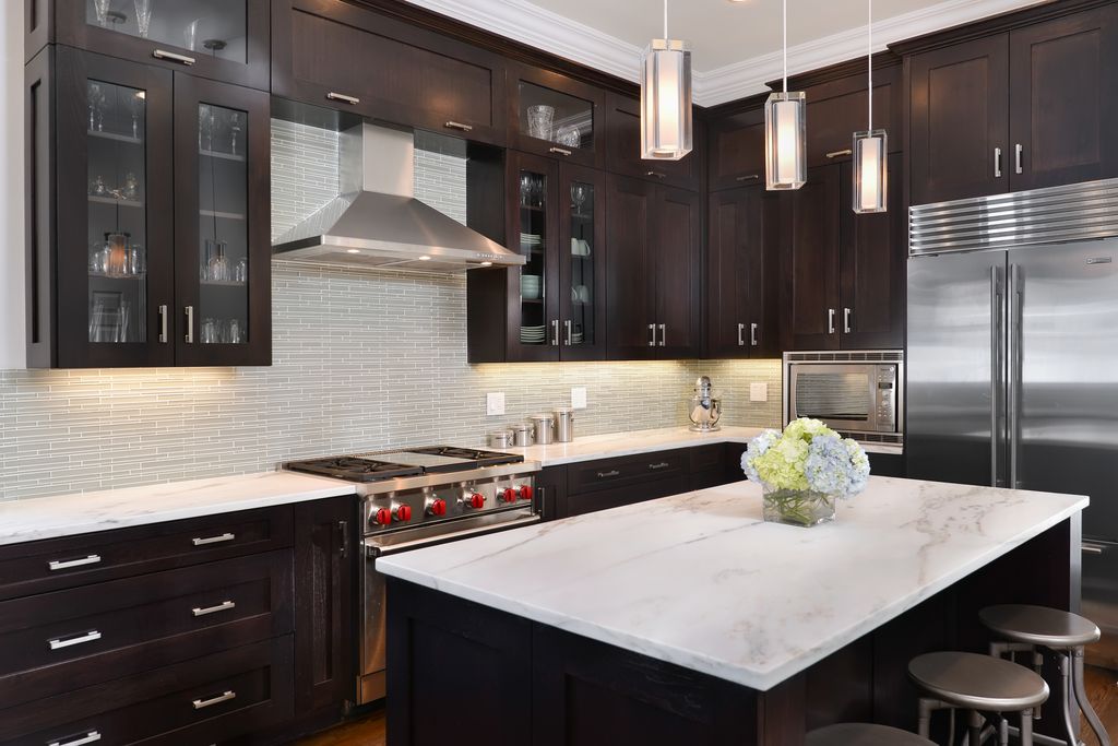 Contemporary Kitchen with Complex marble counters, full backsplash, Glass panel, Flat panel cabinets, Multiple Refrigerators