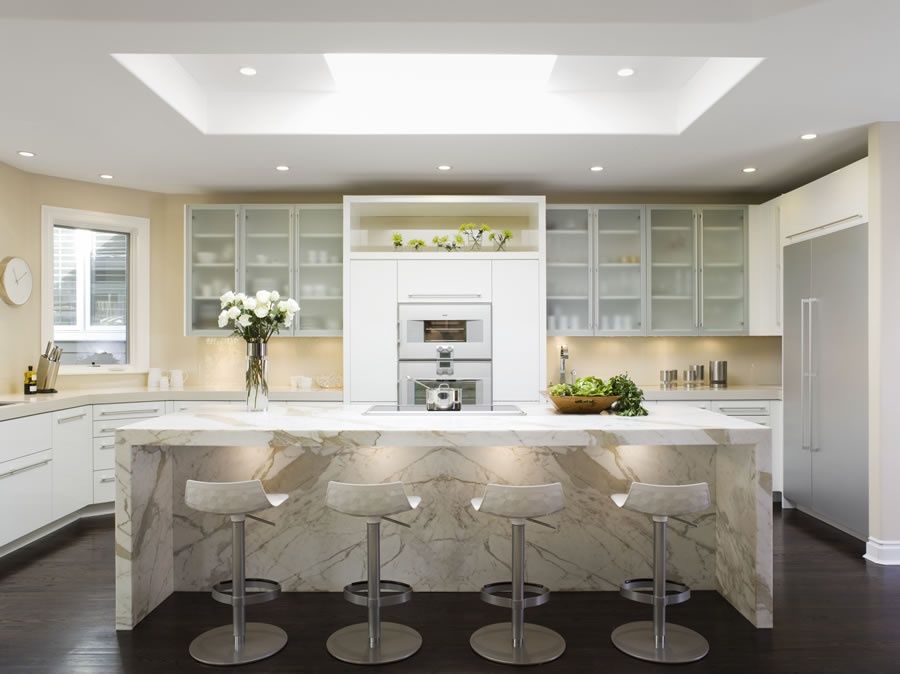 Contemporary Kitchen with Glass panel, Corian counters, Complex marble counters, Casement, U-shaped, Ikea rubrik door fronts
