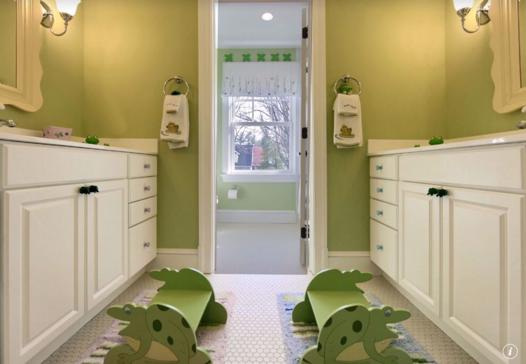 Traditional Kids Bathroom with penny tile floors, Corian counters, Raised panel, Scalloped Framed Mirror, Kids bathroom