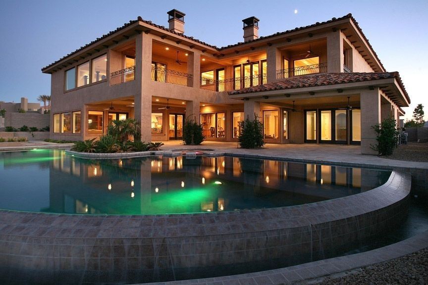 Mediterranean Swimming Pool with Raised beds, Infinity pool, Covered deck, Other Pool Type, exterior stone floors, Pathway