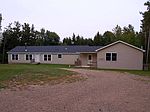 10120 Amos Wood Dr, Williamsburg, MI