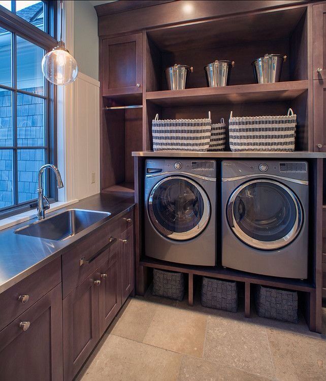 Traditional Laundry Room with complex marble tile floors & Wainscoting ...